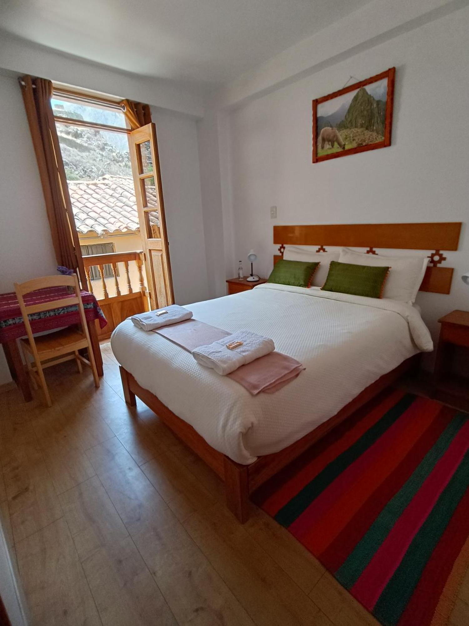 Qente Wings Hotel โอยานไตตามโบ ภายนอก รูปภาพ